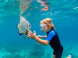 Emerald Faarufushi Resort & Spa Kids Interaction with Bat Fish