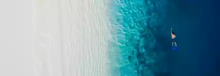 Dhigali-Maldives-Snorkeling-Aerial.jpg