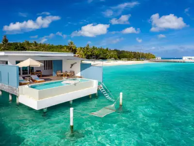 Sunset Water Pool Villa Exterior Amilla Maldives Resort And Residences