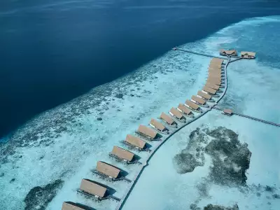 Dhoni Water Villa Aerial COMO Cocoa Maldives