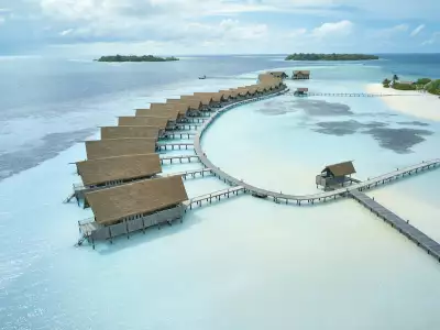 Dhoni Loft Water Villa Aerial COMO Cocoa Maldives