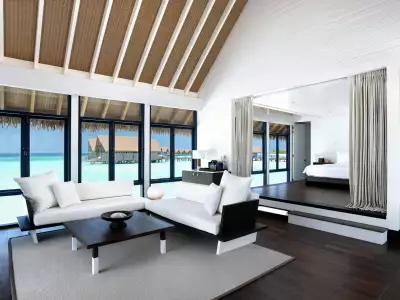 Water Villa with Pool - One Bedroom Living Room COMO Cocoa Maldives