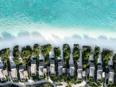 Beach Villa Aerial Emerald Maldives Resort & Spa