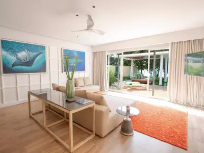 Superior Beach Villa With Pool Living Room Emerald Maldives Resort & Spa
