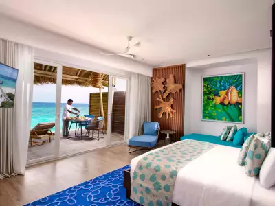 Water Villa Bedroom Emerald Maldives Resort & Spa