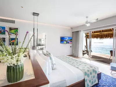 Water Villa Bedroom Emerald Maldives Resort & Spa
