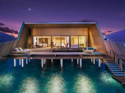 Sunset Over Water Villa with Pool Sunset The St. Regis Maldives Vommuli
