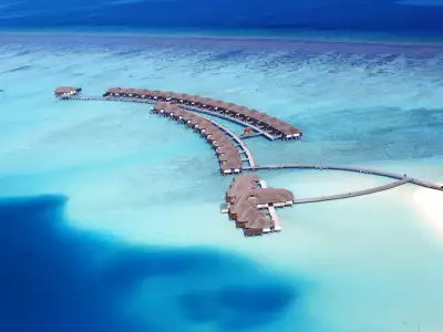 Water Villa Aerial Velassaru Maldives