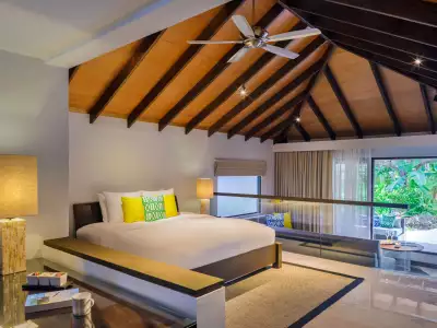 Velassaru Maldives Deluxe Villa Bedroom